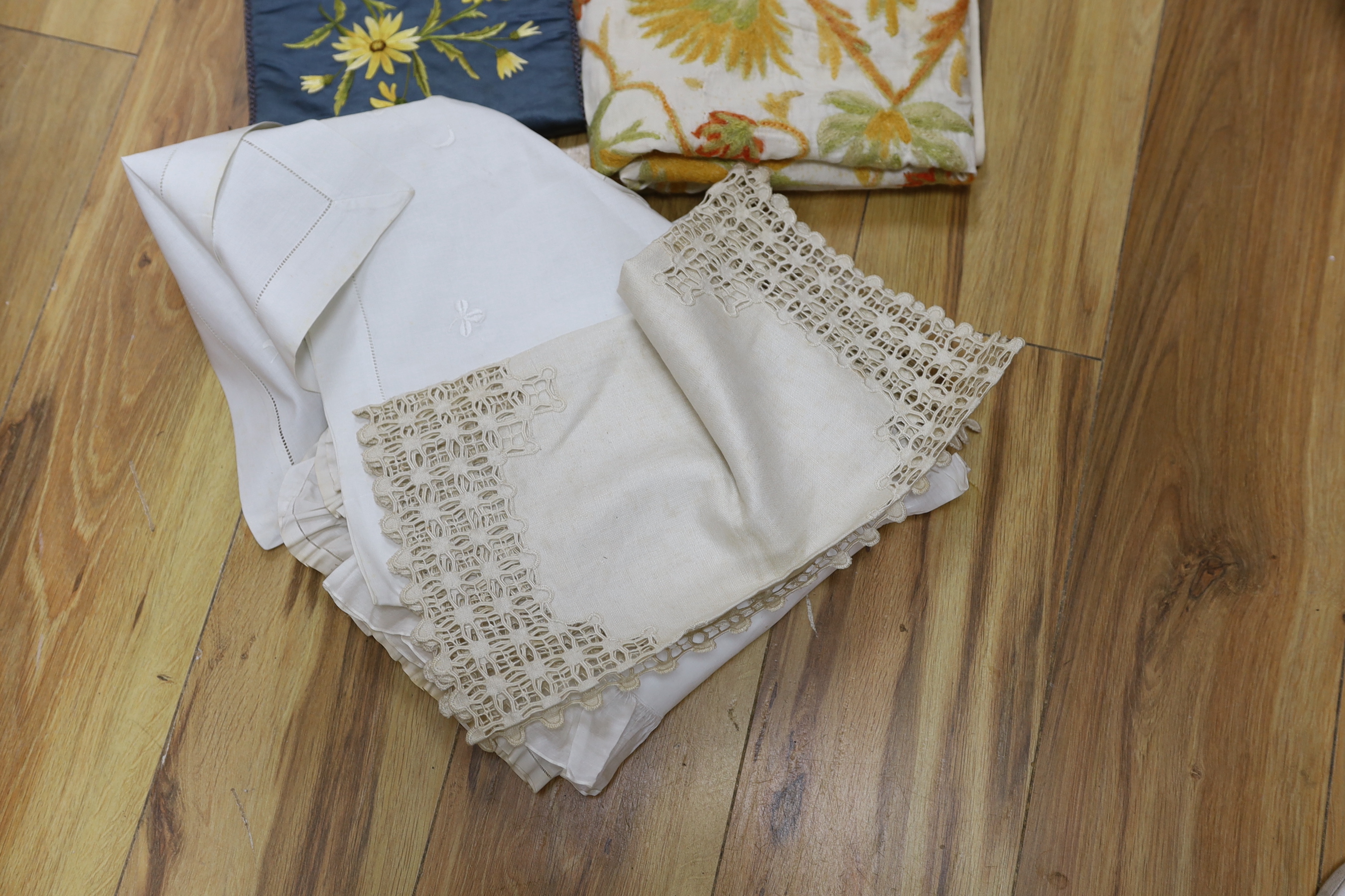 A small group of embroidered, drawn thread and cut-worked table linens